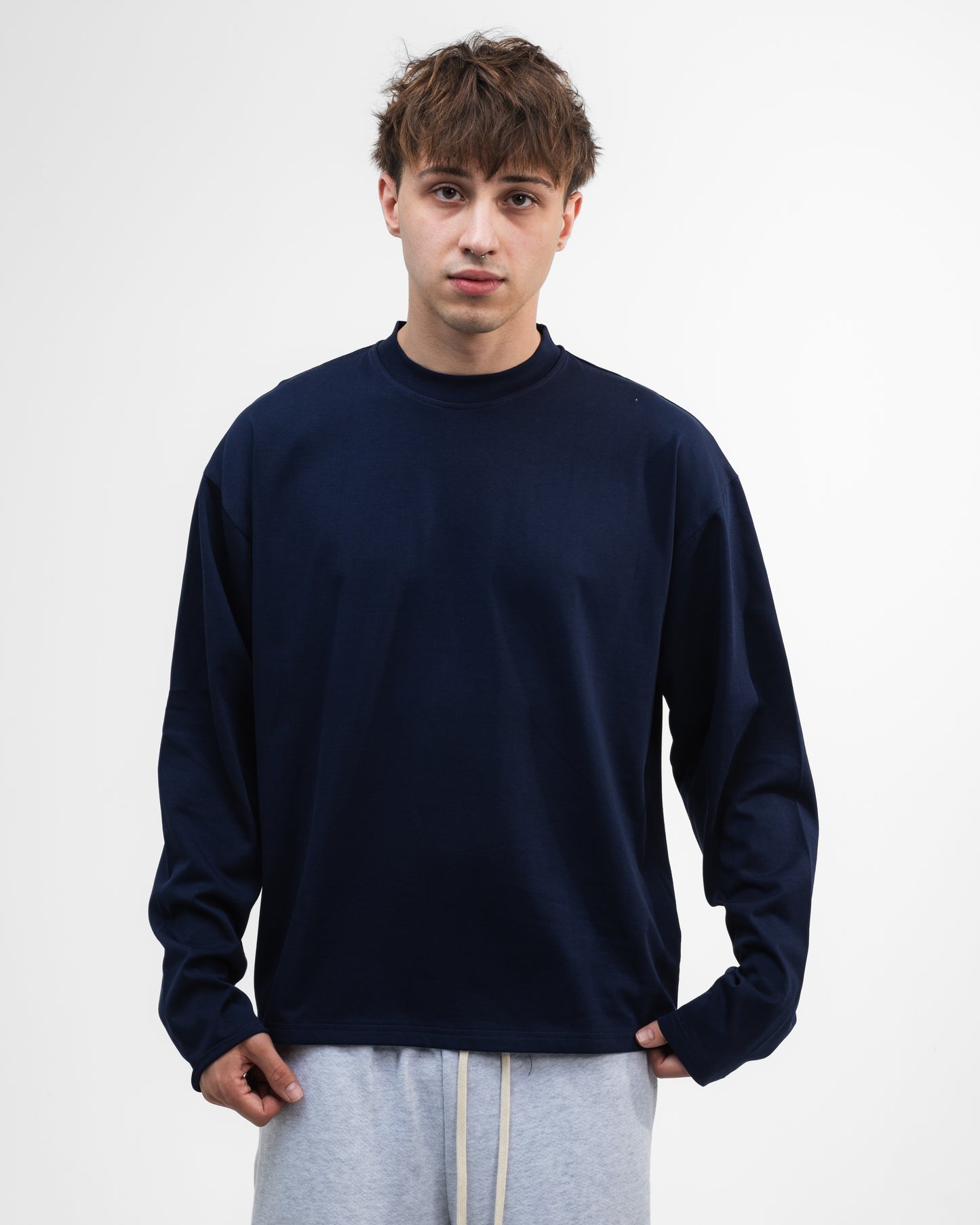 UNSOLVED LION CREST NAVY LONGSLEEVE