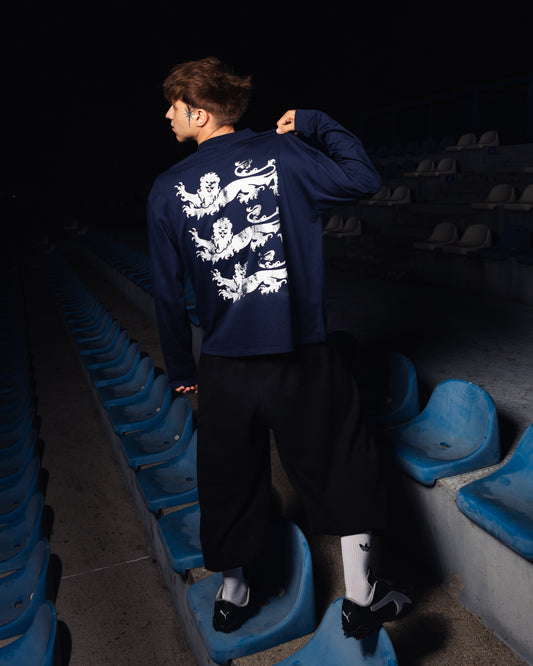 UNSOLVED LION CREST NAVY LONGSLEEVE